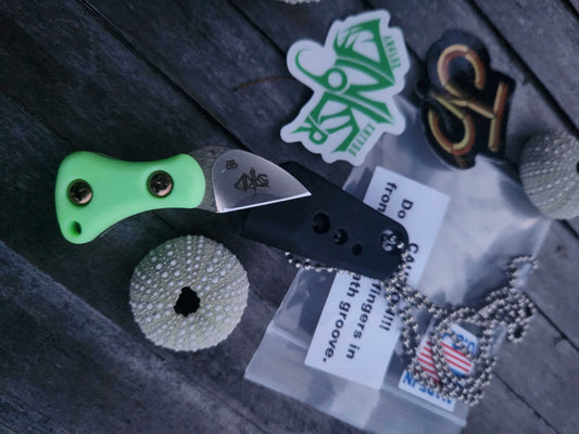 Turner CNC Anchovy - Green glow handle black sheath